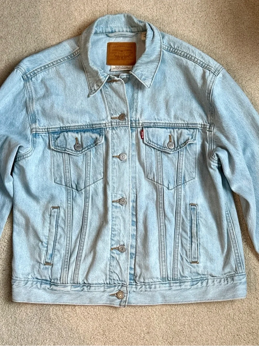 Levi's Light Blue Denim Trucker Jacket with Relaxed Fit & Pockets